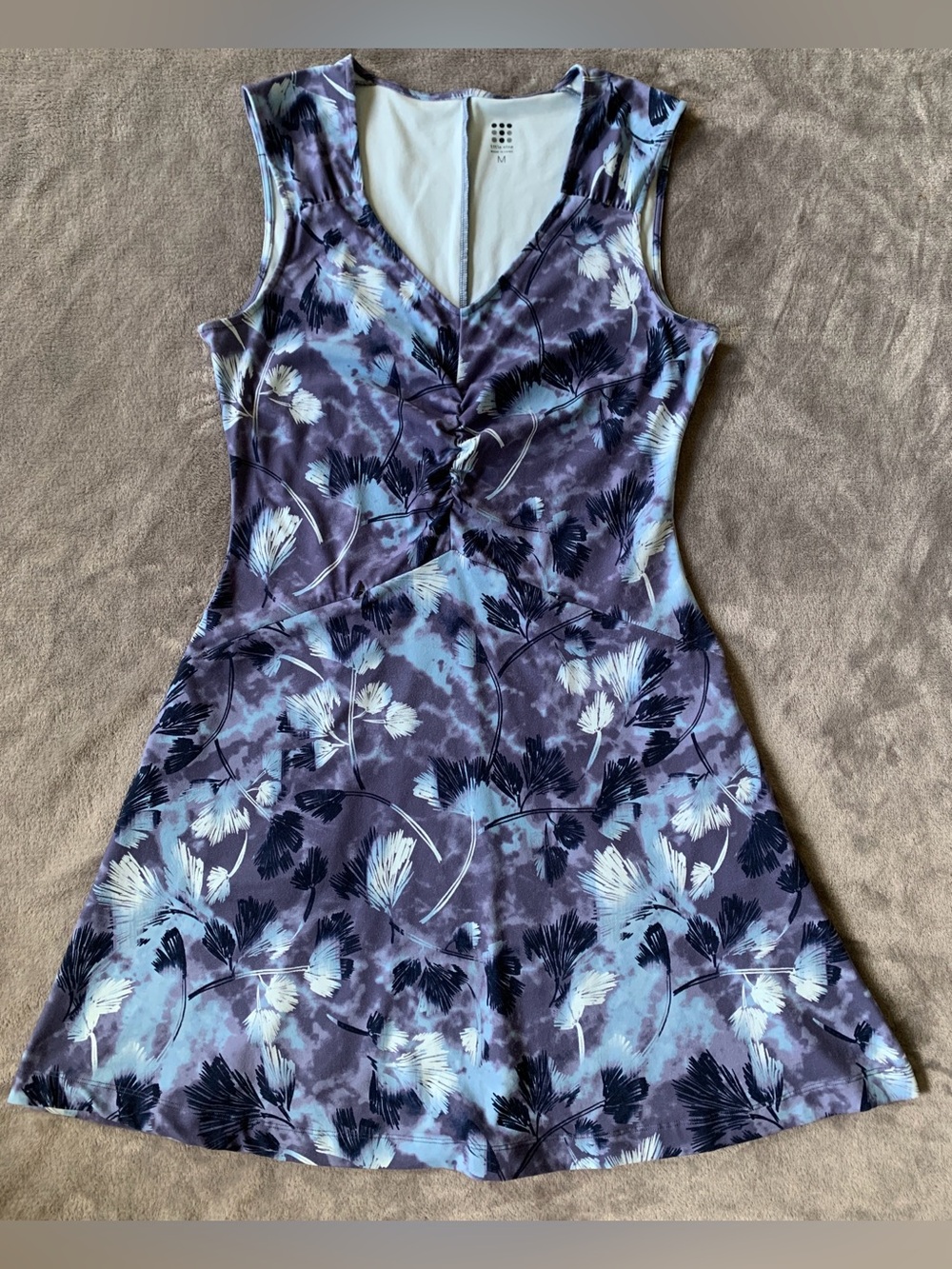 Title Nine Floral Athletic Dress with swift snap patented technology.